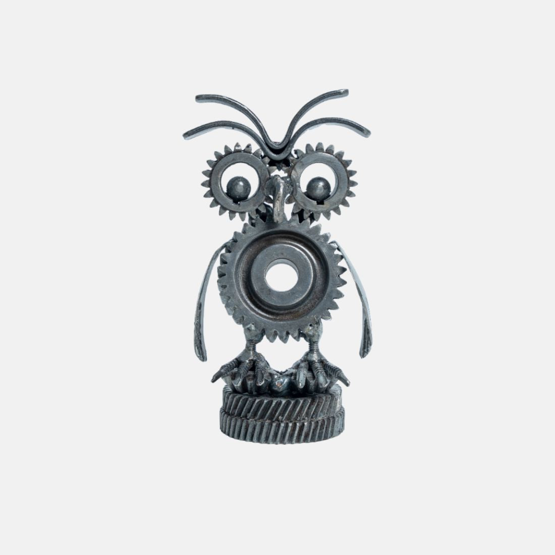 Paper Weight Made Up Of Recycled Metal In A shape Of Owl