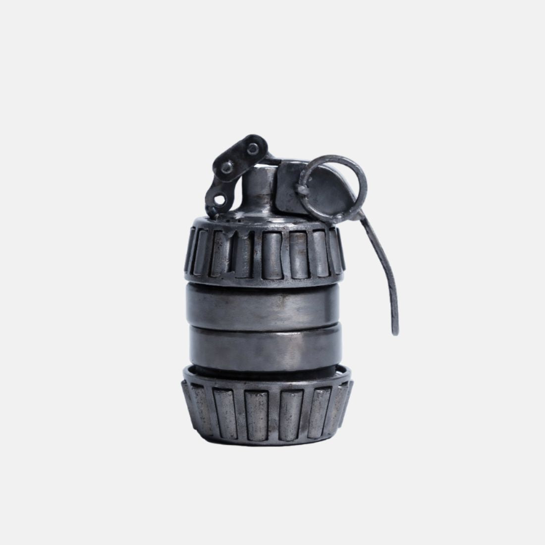 Paper Weight Made Up Of Recycled Metal In A shape Of Hand Granade