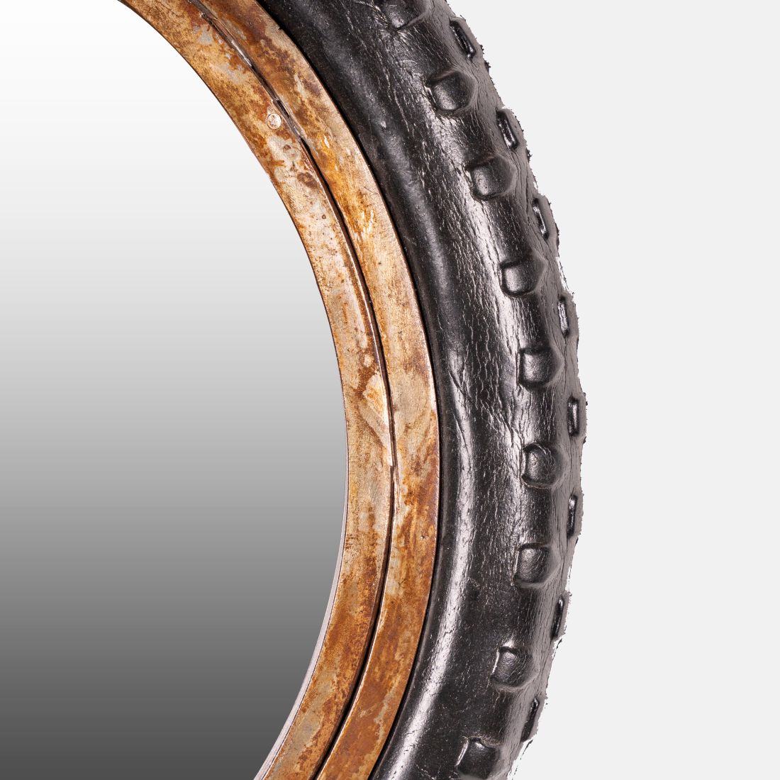 Wall Mount Mirror Madeup Of Small Bicycle Tyre With A Combination Of Rusty Look Metal