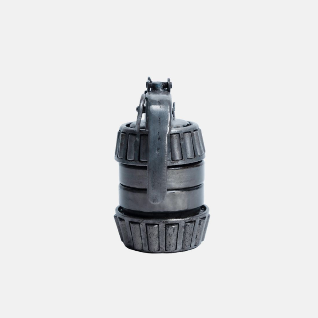 Paper Weight Made Up Of Recycled Metal In A shape Of Hand Granade